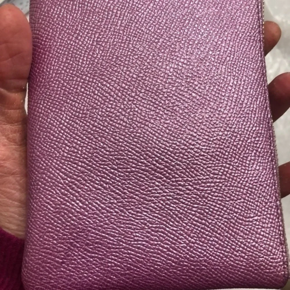 Coach purple shimmer wristlet bag